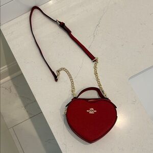 Coach Red Heart-Shaped Bag with Gold Accents